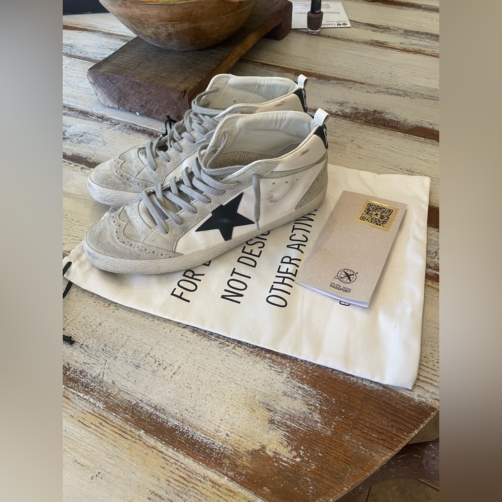 Golden goose Midstar 100% authentic. Worn twice in perfect condition. 500 TYD